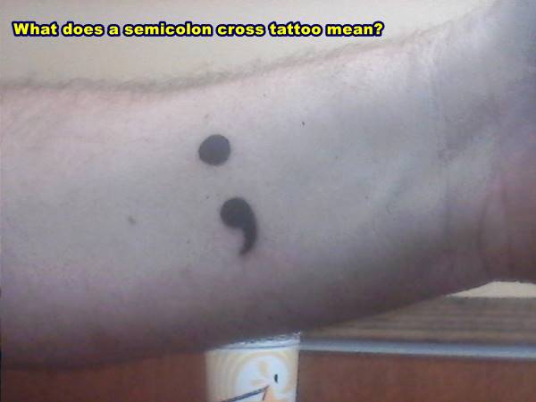 What does a semicolon cross tattoo mean?